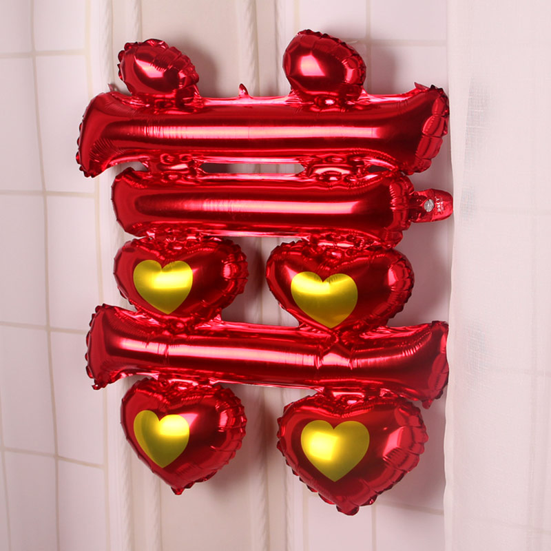 Wedding room decoration, wedding decoration, aluminum film balloons, wedding balloons, "happiness" characters on the bedside table, "happiness" characters pasted on aluminum film balloons Application Scenario