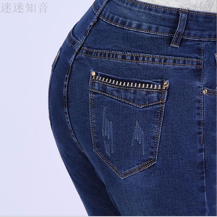 Autumn and winter new women's denim pants Korean version of mid-waist straight leg large size women's pants