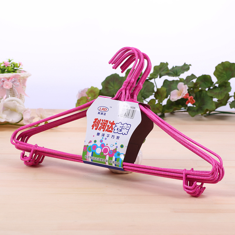 Thick metal plastic-coated clothes drying rack with hooks and twisted flower rack, suitable for both dry and wet use details Picture