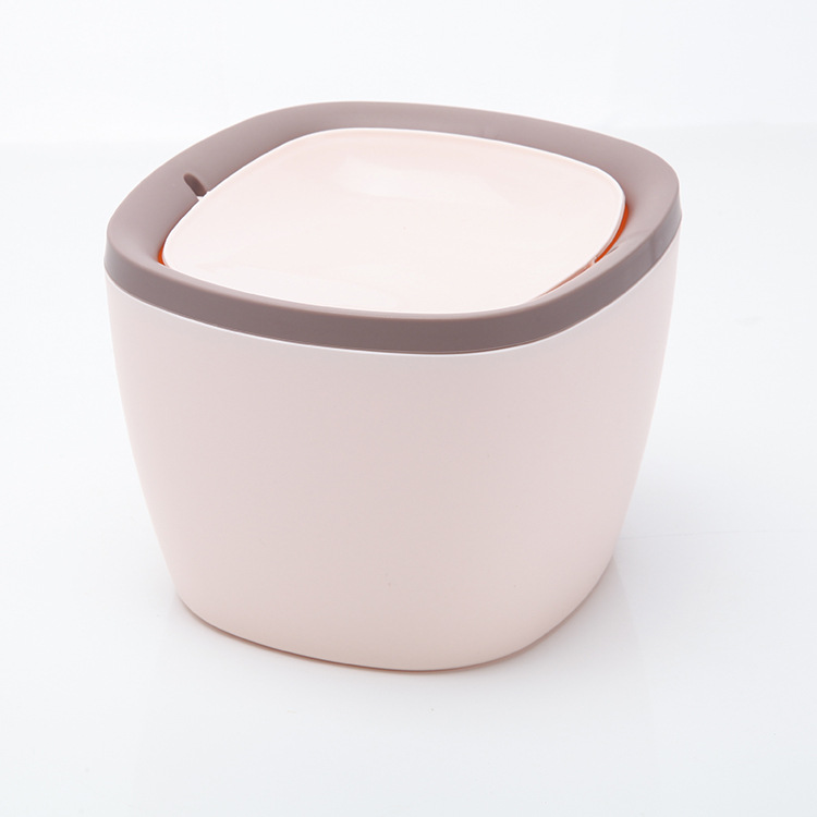 The flip-top desktop trash can is a fashionable and creative office desk, a mini trash can for car and home use details Picture