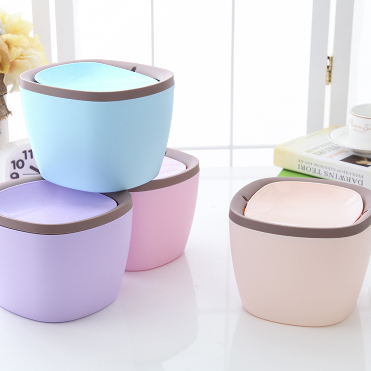 The flip-top desktop trash can is a fashionable and creative office desk, a mini trash can for car and home use full figure
