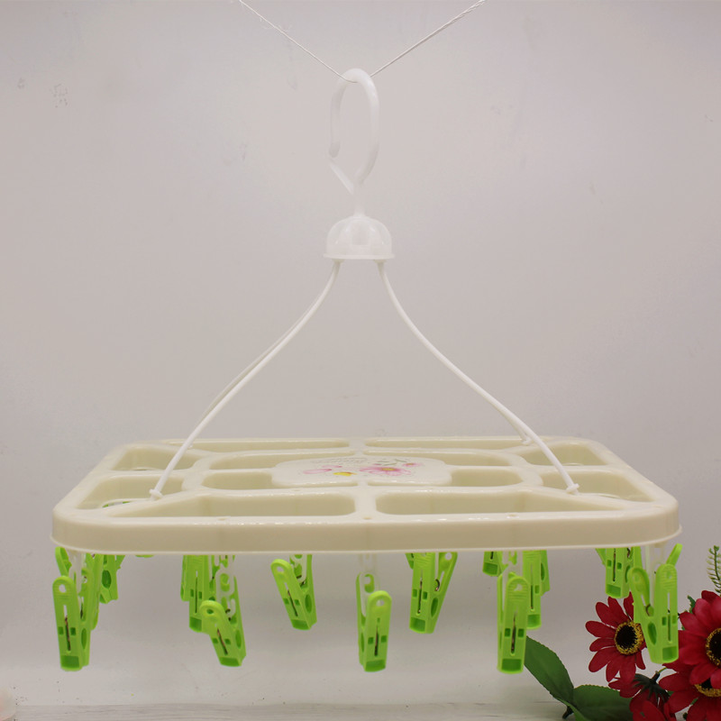 Baby clothes hanger, children's and baby underwear, multi-functional plastic small clip hook, round household windproof large clothes drying rack Application Scenario
