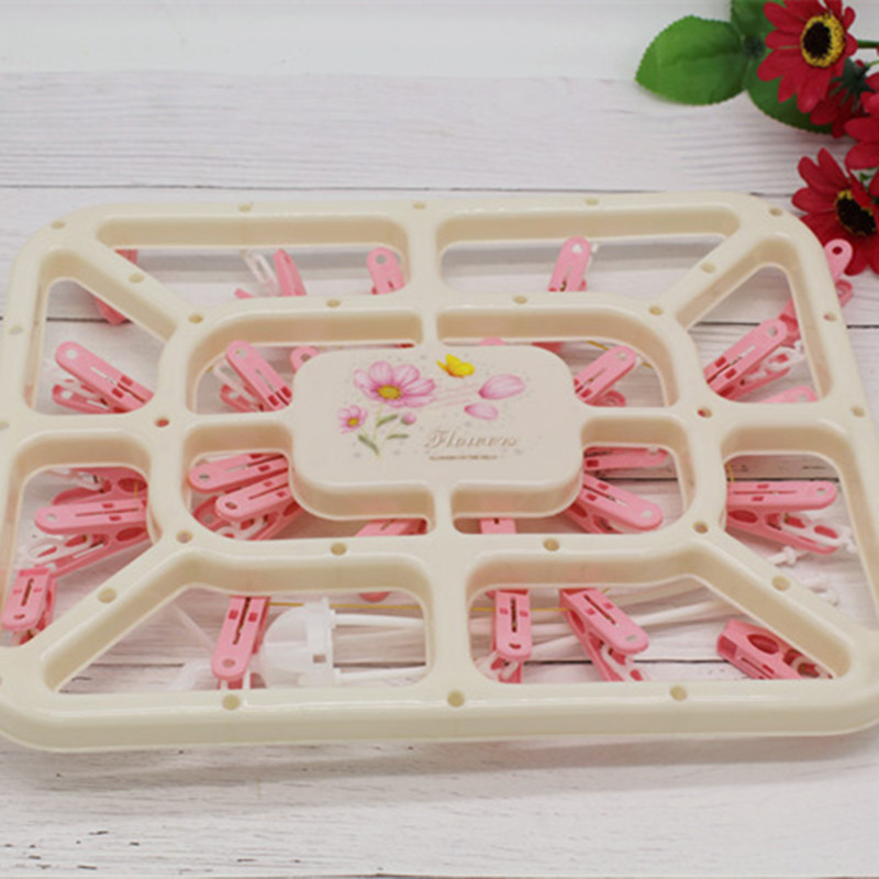 Baby clothes hanger, children's and baby underwear, multi-functional plastic small clip hook, round household windproof large clothes drying rack details Picture
