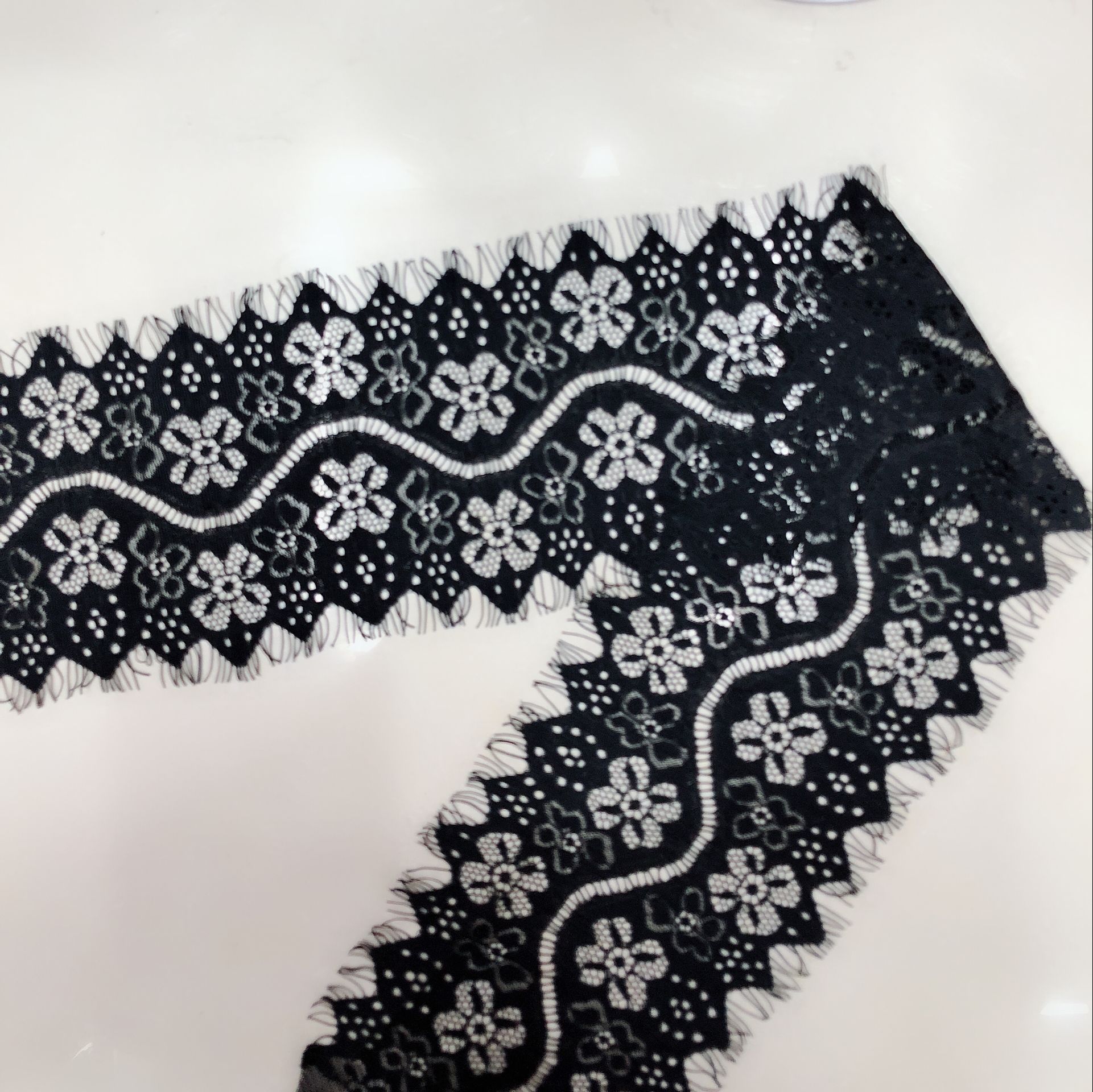 The non-elastic lace eyelash lace skirt and scarf are bestsellers