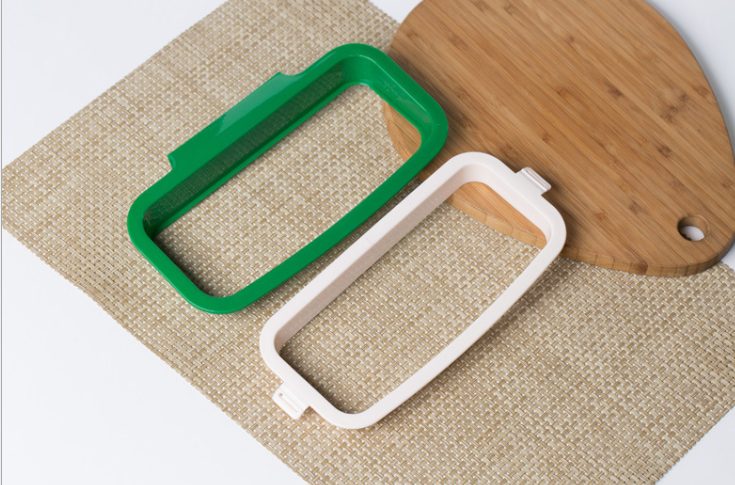 Upgraded wall-mounted kitchen door-back cabinet garbage bag stand with anti-drop buckle garbage bag storage rack Application Scenario