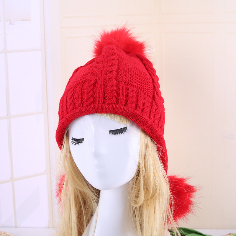 Korean version women's thickened winter double-layer fashionable knitted hat with 3 pom-poms and warm strings is in stock for wholesale