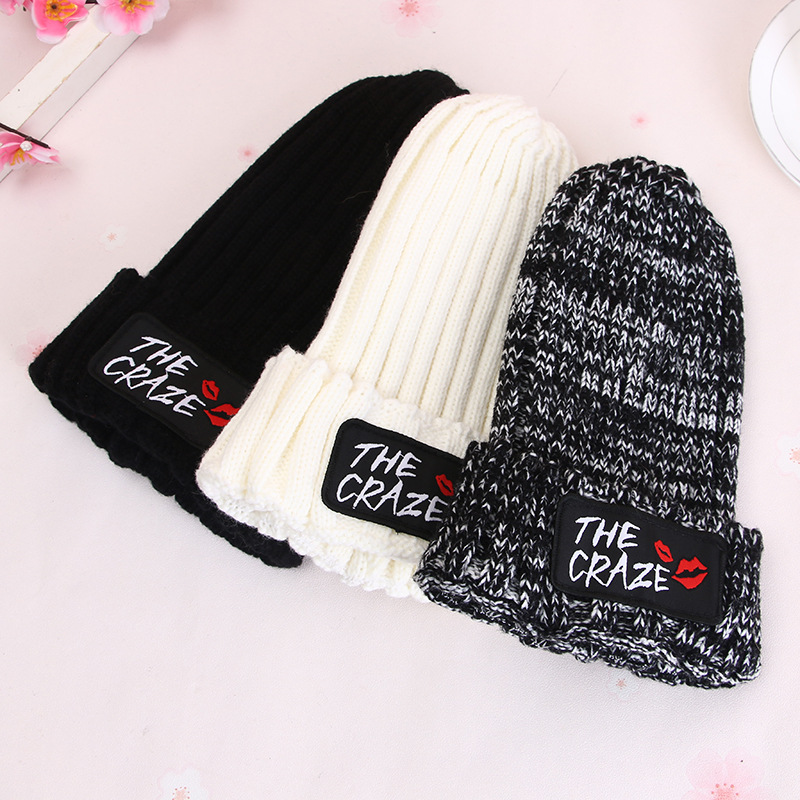 Wholesale of 2016 winter Korean version new woven label trendy men's and women's pullover pointed hats and warm woolen hats