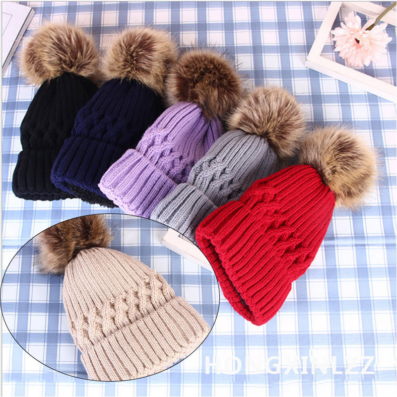 New Korean outdoor knitted cap, solid color with pom-poms, winter woolen cap, thickened warm hat in stock for wholesale