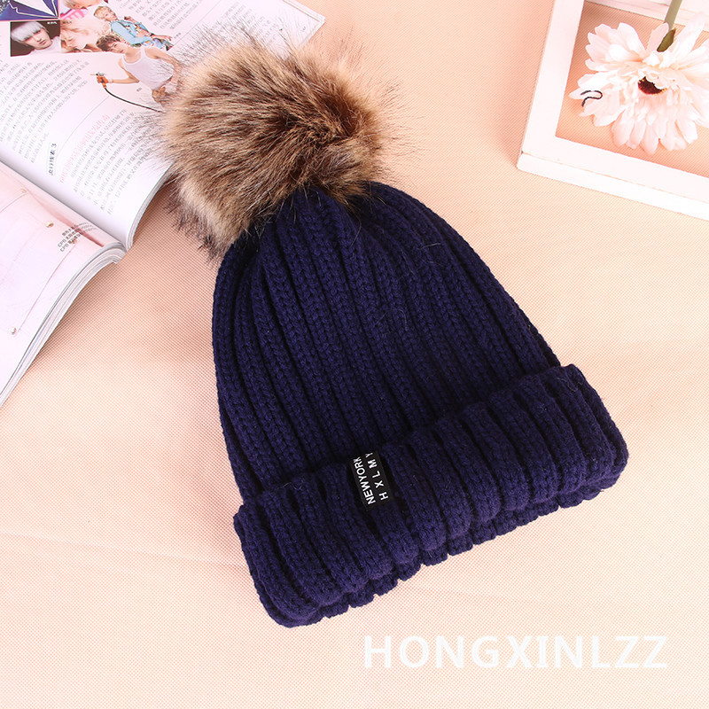 Wholesale of new Korean style autumn and winter thickened woolen caps for women with rolled edges and fashionable wool balls Specification image