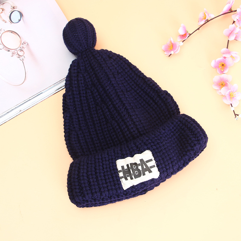 Solid color pointed warm thickened Korean version autumn and winter pacifier wool knitted cap accessories in stock, female style and student wholesale Specification image