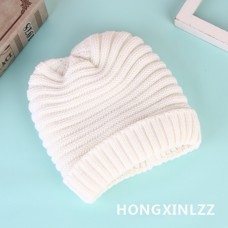 Wholesale of multi-layer hats with fleece and thickened wool winter hats for women with rolled edges and fashionable pom-pom Korean-style knitted hats from manufacturers