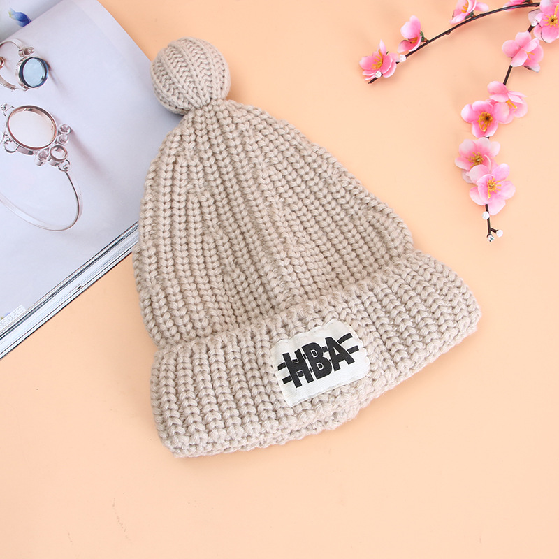Solid color pointed warm thickened Korean version autumn and winter pacifier wool knitted cap accessories in stock, female style and student wholesale details Picture