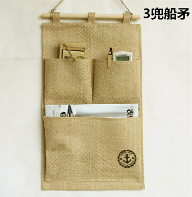 Wall-mounted jute fabric hanging storage bags, mobile phone hanging bags, dormitory storage hanging bags