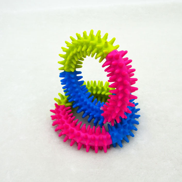 TPR rubber pet supplies, scratch-resistant dog toys, non-toxic and environmentally friendly pet toys, three-color spines, dog teething and biting toys, three-color details Picture