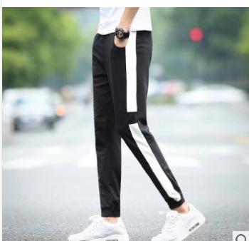 New autumn men's sweatpants, European and American contrasting color striped ribbon tapered men's elastic and casual pants