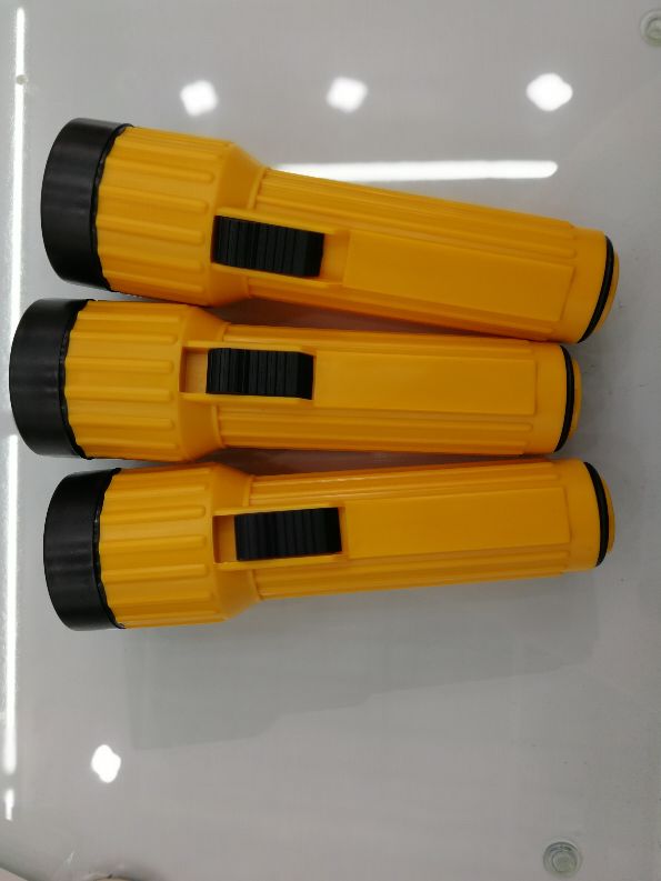 The old plastic yellow flashlight with a yellow bulb Specification image