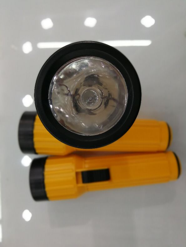 The old plastic yellow flashlight with a yellow bulb Application Scenario