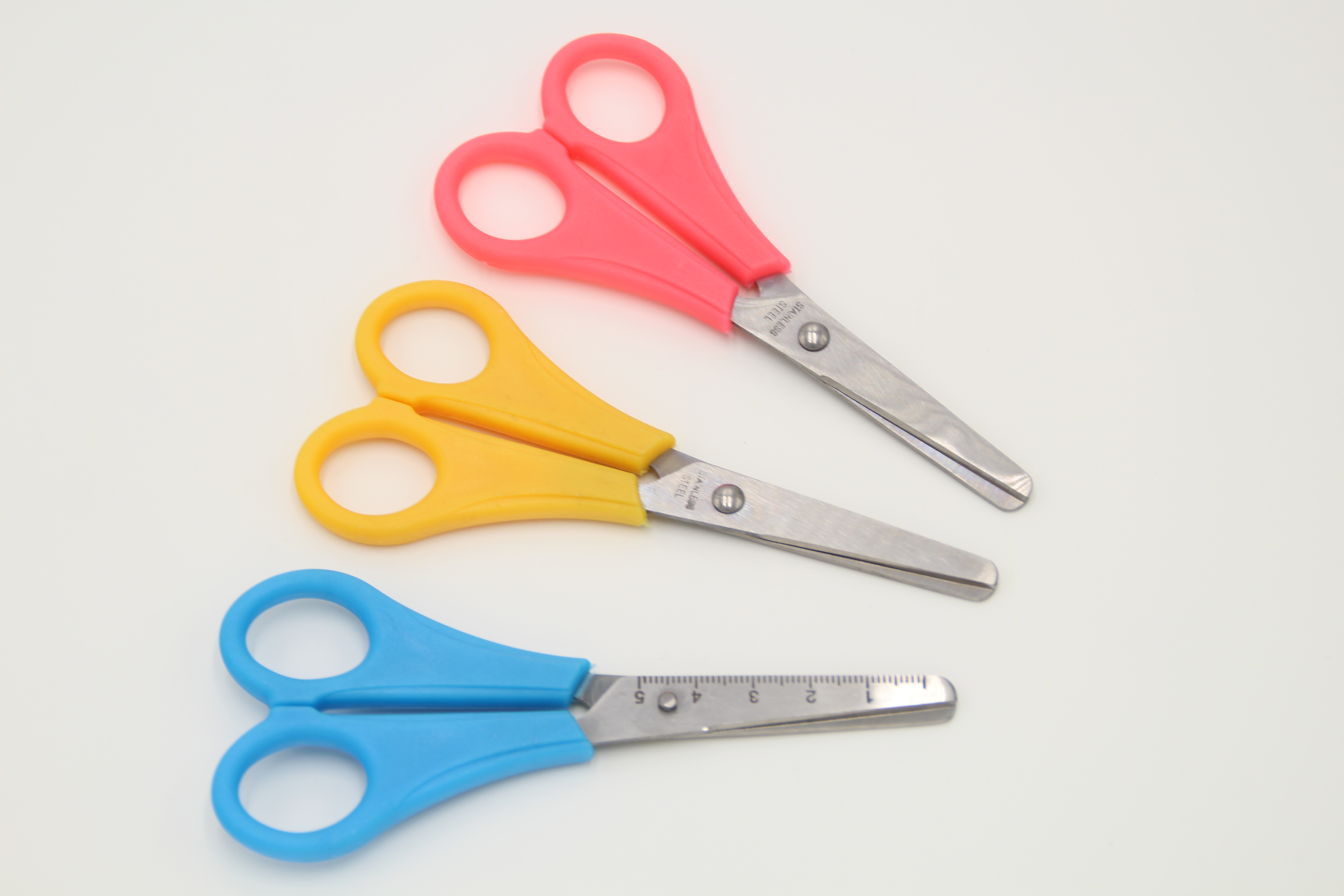 Students cut office scissors, paper-cutting knives and plastic scissors details Picture