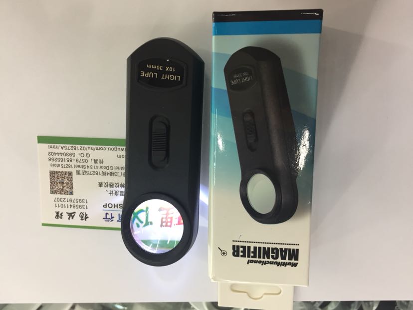 600113高倍带支架珠宝放大镜10x图