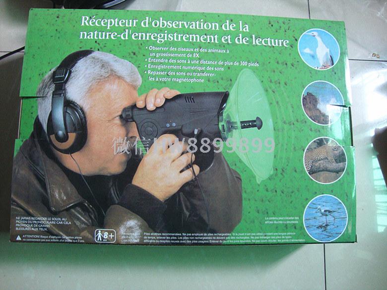 Birdwatcher recording bird finder Listening magnifier sound with headphones
