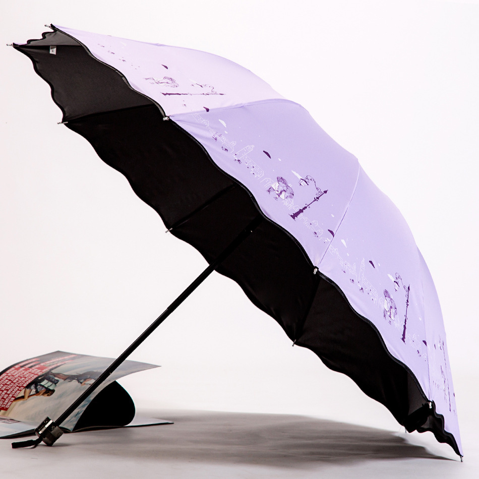 3311 新款情侣路灯印花荷叶厂家直销黑胶防晒晴雨伞产品图