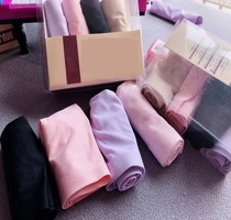 Traceless breathable ice silk underwear lift hip sexy triangle shorts for women