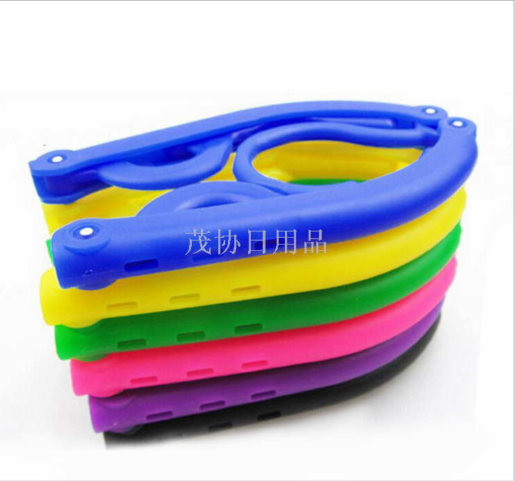 创意旅行衣架批发塑料地摊儿童折叠服装