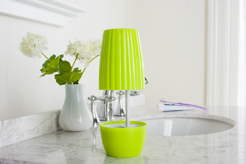 Potted toiletries set available. A toiletry set. Table lamp toothbrush holder