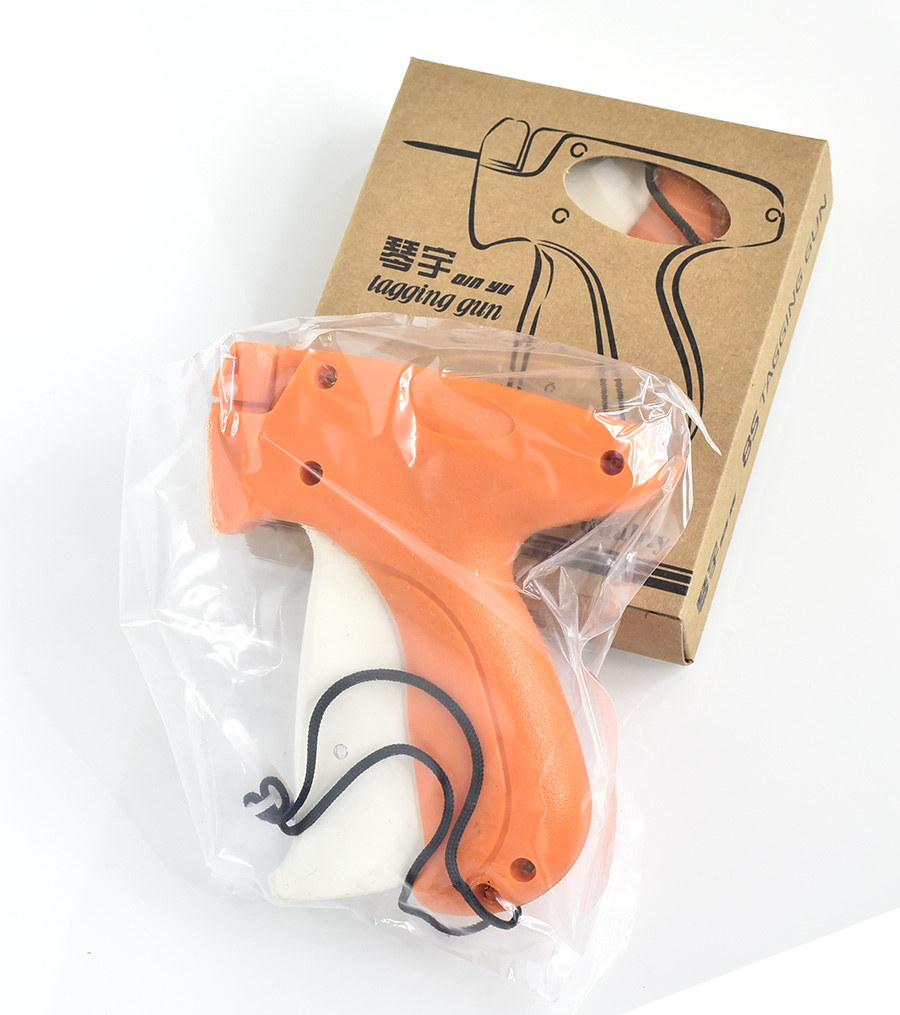 Tag gun, glue needle gun, pin header gun, Qinyu tag gun, glue needle gun, label gun, trademark gun, tag gun, thick needle gun, thick material tag gun Application Scenario