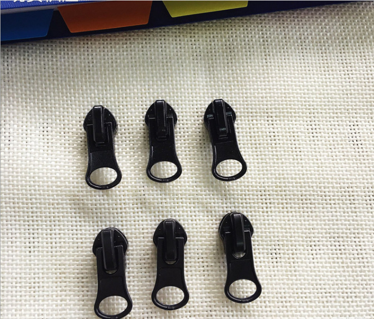 Promotion: No. 5 nylon reverse wearing almond pull TAB clothing waterproof zipper electrophoretic pull TAB hardware in stock pull TAB Specification image