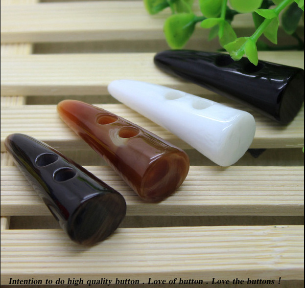 厂家直销 优质外套常用橄榄扣 牛角扣 树脂纽扣 量大从优  