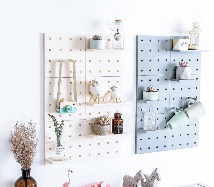 Plastic perforated boards are used for storing living room, kitchen, bedroom partitions, wall hangings, and wall shelves details Picture