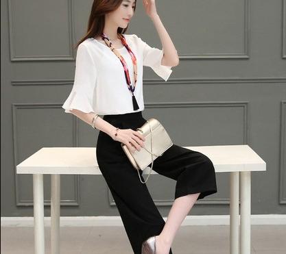 A two-piece Korean-style wide-leg capri pants with flared sleeves
