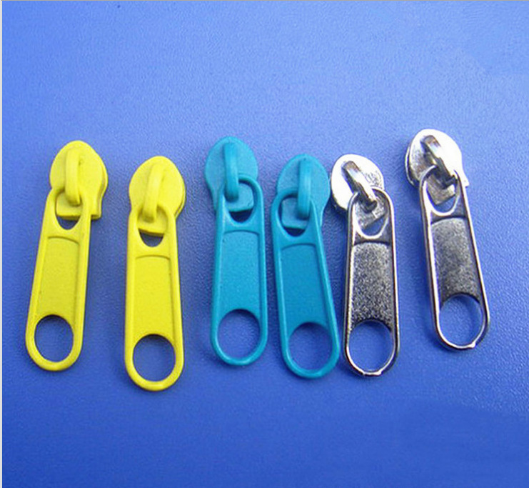 厂家直销拉链头现货供应现金属拉头喷漆长板头电白色拉链长板头图