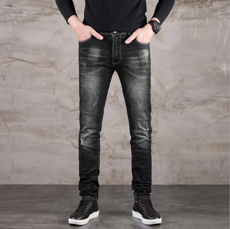 2018 new denim pants ripped male Korean version of youth small feet elastic winter pants trend