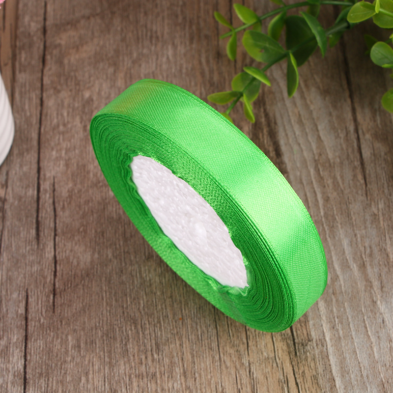 Assorted colored ribbons displayed in gradient tones suitable for seasonal collections