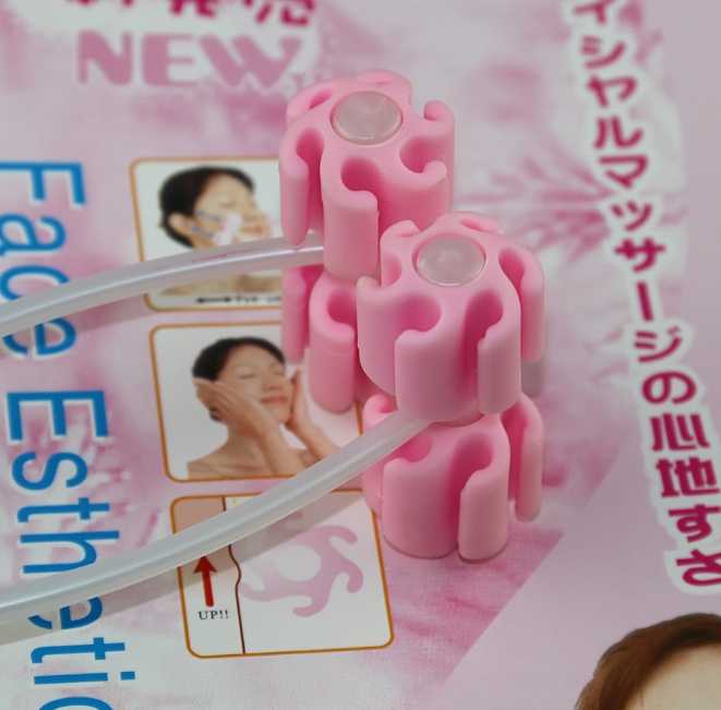 Face slimming tool, roller-type face slimming wonder, facial expression muscle tightening, plum blossom-shaped flower roller-shaped small z-11 Application Scenario