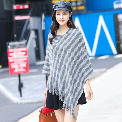 Korean version thickened warm personality sexy hollow tassel jacket cape cape pullover woman