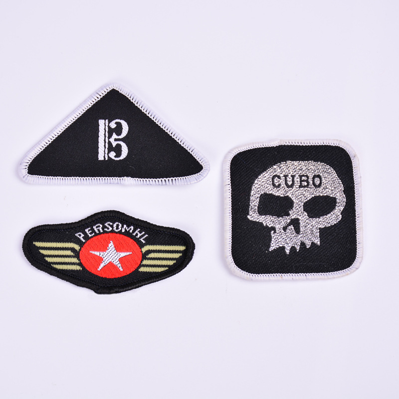 海盗骷髅锁边织标环保涤纶纱厂家直销电脑商标织唛织标