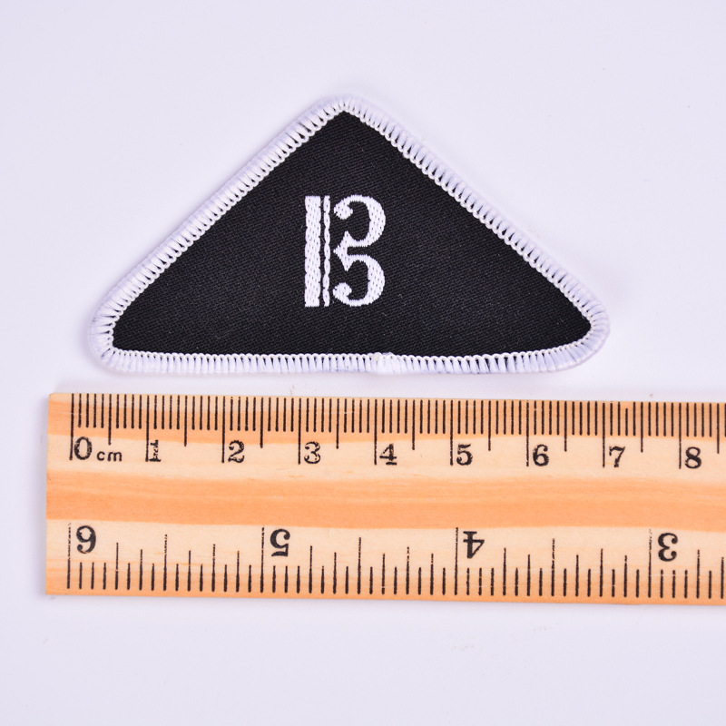 海盗骷髅锁边织标环保涤纶纱厂家直销电脑商标织唛织标细节图