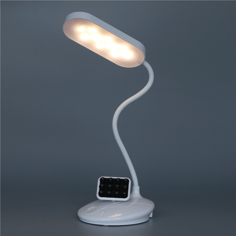 LED dual-source desk lamp, mobile phone stand, night light, adsorption tray, lazy person stand desk lamp, creative gift lamp Application Scenario