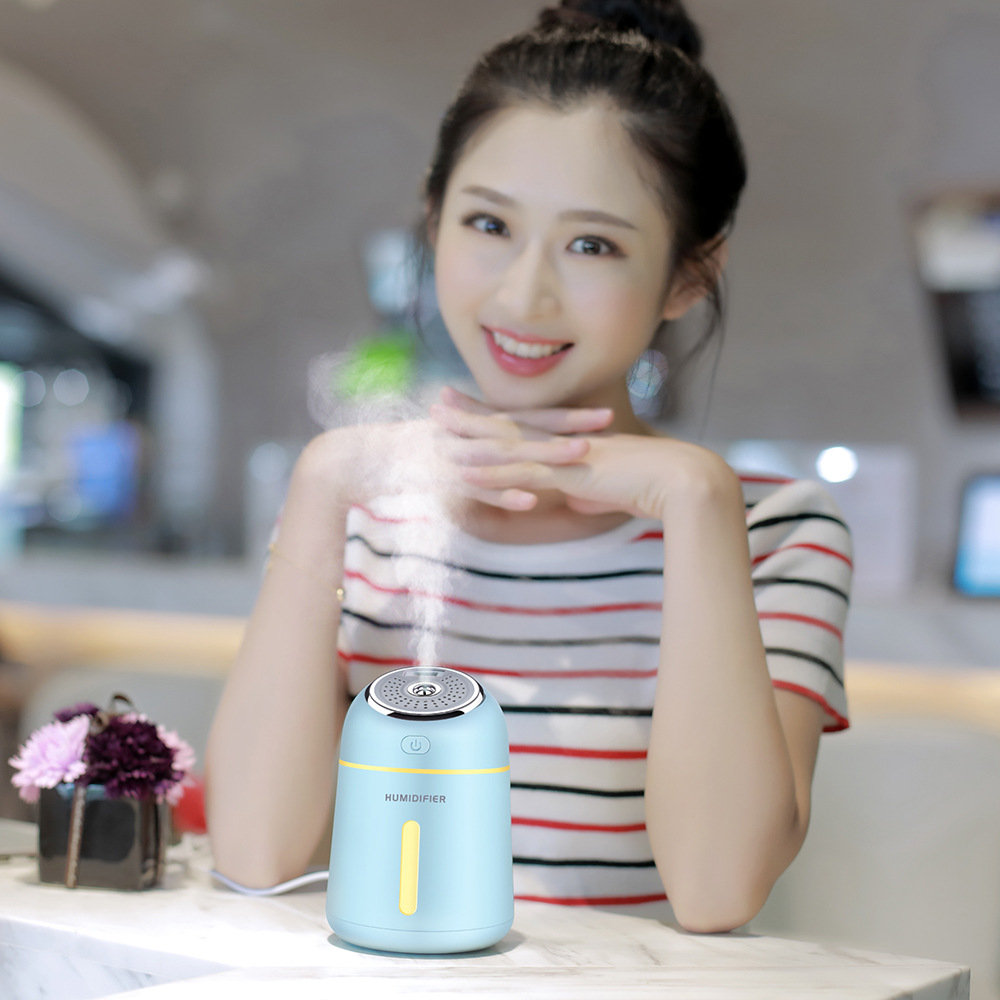 Creative new foggy quiet small Q home desktop mini USB humidifier 4-in-1 aromatherapy machine