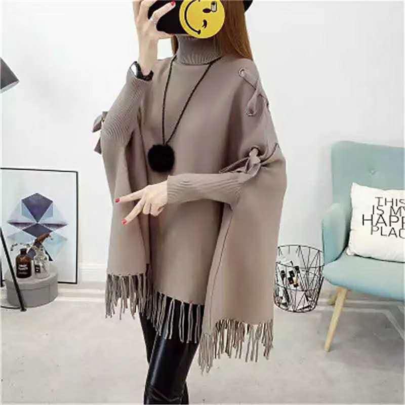 秋冬女装蝙蝠衫宽松针织斗篷式披肩外套中长款高领套头流苏毛衣