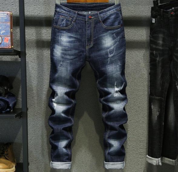 2018 Autumn Ripped jeans for young men, slimming Korean-style men's jeans, trendy men's clothing factory direct sales