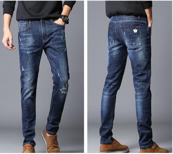 Manufacturers direct sales autumn new ripped jeans male Korean version trend slim-fit small foot pants hair