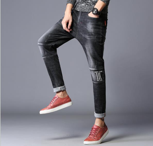 2018 new jeans European and American men's fashion brand personality small feet men's youth slim-fit fashion jeans