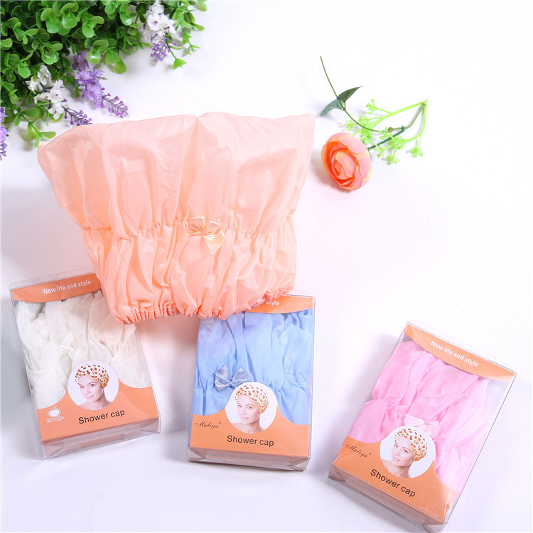 厂家直销热卖 蝴蝶盒装浴帽 材质舒适 带蝴蝶结 洗澡必备产品图