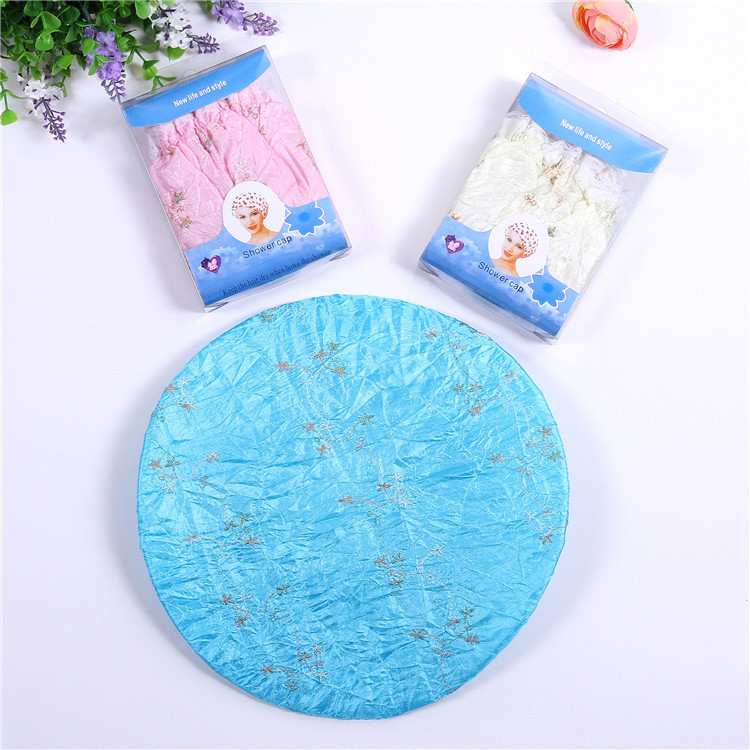 厂家直销热卖 绣花浴帽 环保PE材质浴帽 带花型的护发套