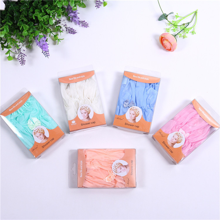 厂家直销热卖 蝴蝶盒装浴帽 材质舒适 带蝴蝶结 洗澡必备细节图