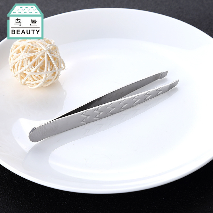 Factory direct sales of beauty tools, stainless steel eyebrow tweezers, eyebrow tweezers, eyebrow trimmers, one-piece consignment N003 details Picture